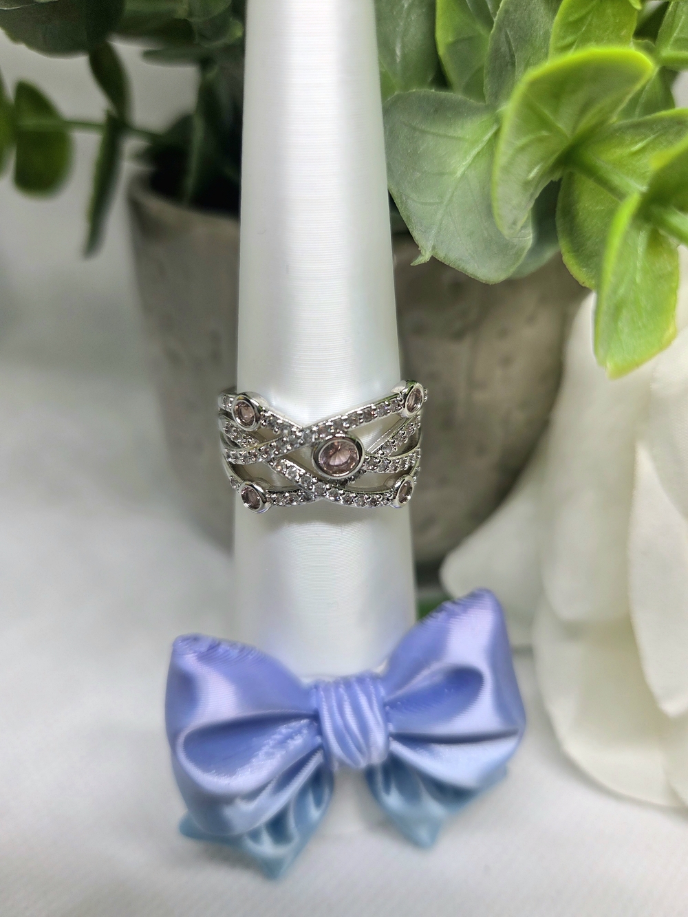 BP Ring with Unique Light Pink CZ Bezel Stones On Rhodium Plating